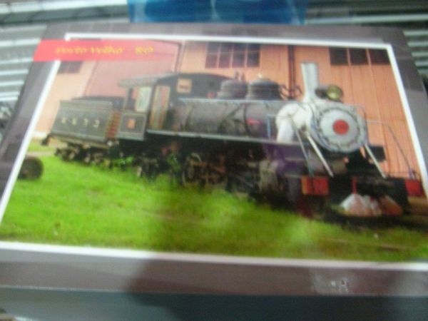 Caixas com imagens da locomotiva - Ro